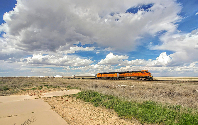 A wind blade train operates near Las Animas, Colorado.